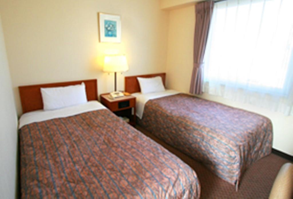 Star Hotel Koriyama Pokoj fotografie
